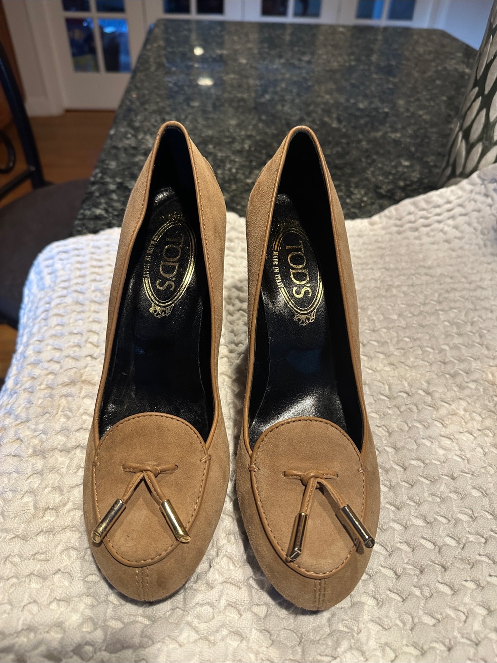 Tod's Tan Suede Tassel Pumps with Gold Accents